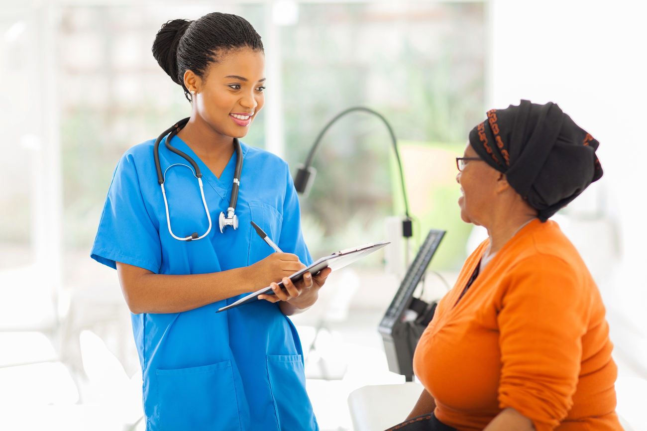 beautiful african medical nurse and senior patient
