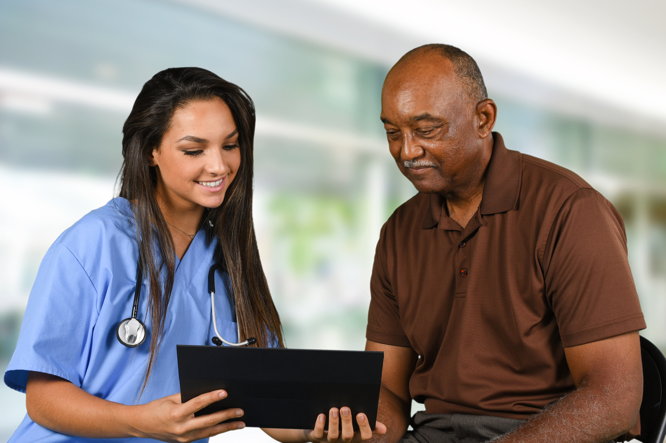 Health Care Worker and Elderly Patient
